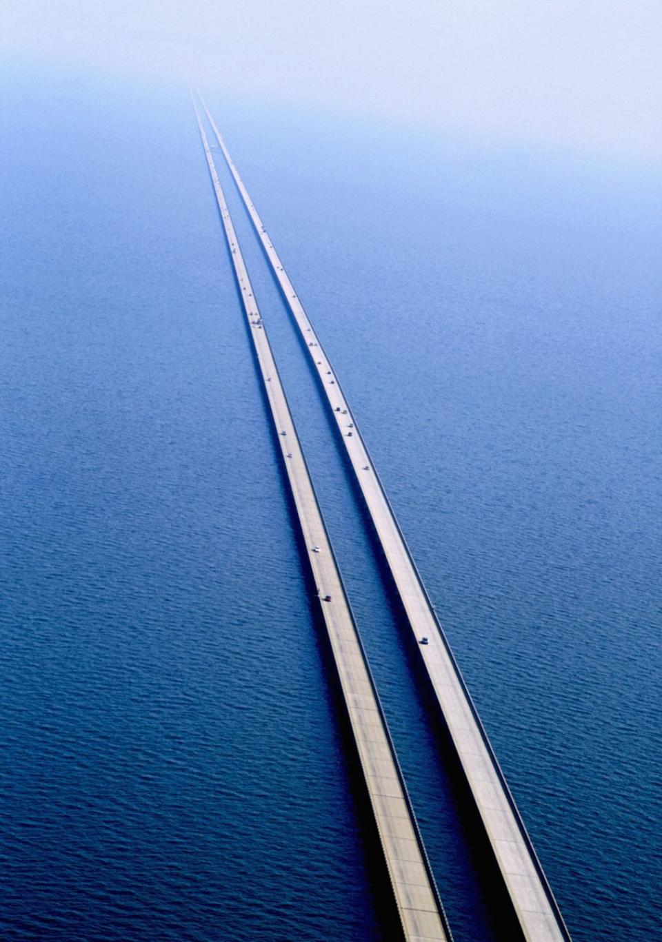 <p> The Lake Pontchartrain Causeway bridge in New Orleans, Louisiana is the <a href="https://www.atlasobscura.com/places/lake-pontchartrain-causeway" rel="nofollow noopener" target="_blank" data-ylk="slk:longest continuous bridge;elm:context_link;itc:0;sec:content-canvas" class="link ">longest continuous bridge</a> passing over water. It's nearly 24 miles long (and for eight of those miles, you can't even see any land at all).  </p><p><strong>RELATED:</strong> <a href="https://www.goodhousekeeping.com/life/travel/g2425/beautiful-photos-america/" rel="nofollow noopener" target="_blank" data-ylk="slk:51 Photos That Prove America Truly Is Beautiful;elm:context_link;itc:0;sec:content-canvas" class="link ">51 Photos That Prove America Truly Is Beautiful</a></p>