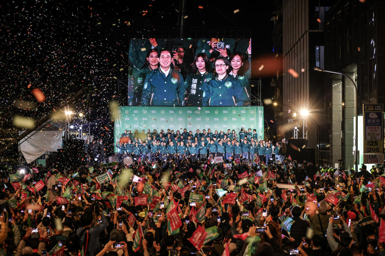 Confetti flies over the stage and crowd as Taiwan's Vice President and presidential-elect from the Democratic Progressive Party Lai Ching-te and his running mate Hsiao Bi-khim speak to supporters on Jan. 13, 2024 in Taipei, Taiwan.  (Annice Lyn / Getty Images)