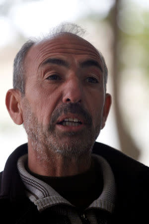 Abdul Ilah Jassim, who lost his brother Aiden Jassim, speaks during an interview with Reuters in Fadiliyah, Iraq, November 30, 2016. REUTERS/Khalid al Mousily