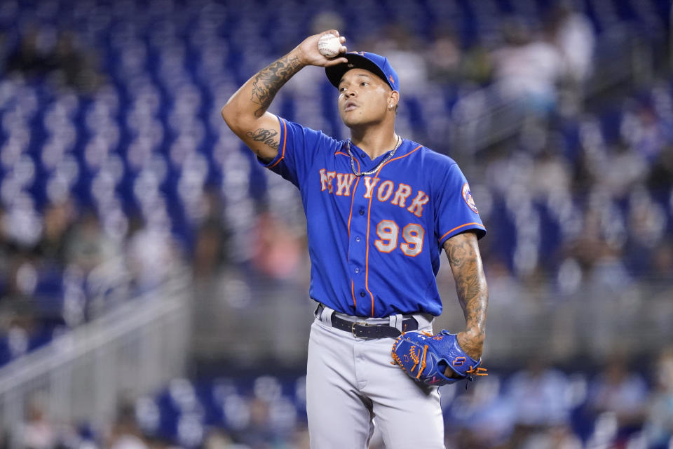 New York Mets starting pitcher Taijuan Walker (99) reacts after giving up a solo home run to Miami Marlins' Isan Diaz during third inning of a baseball game, Tuesday, Aug. 3, 2021, in Miami. (AP Photo/Lynne Sladky)