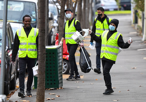 Cleaners wipe down amenities in Melbourne as the city re-enters a city wide lockdown after a fresh outbreak of the COVID-19 coronavirus.