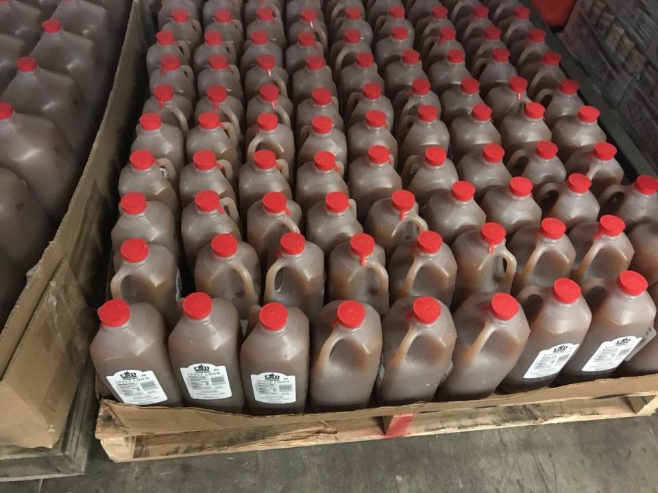 Apple cider ready for sale at Cold Hollow Cider Mill, as seen on Nov. 19, 2021.