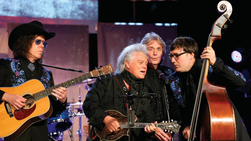 Marty Stuart performs at  Country Music: Live at the  Ryman, with Vince Gill.