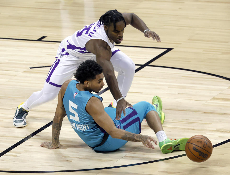 James Bouknight loses the ball to Davion Mitchell, one of five turnovers the Hornets guard committed against Mitchell's Kings at the 2021 NBA Summer League. (Ethan Miller/Getty Images)