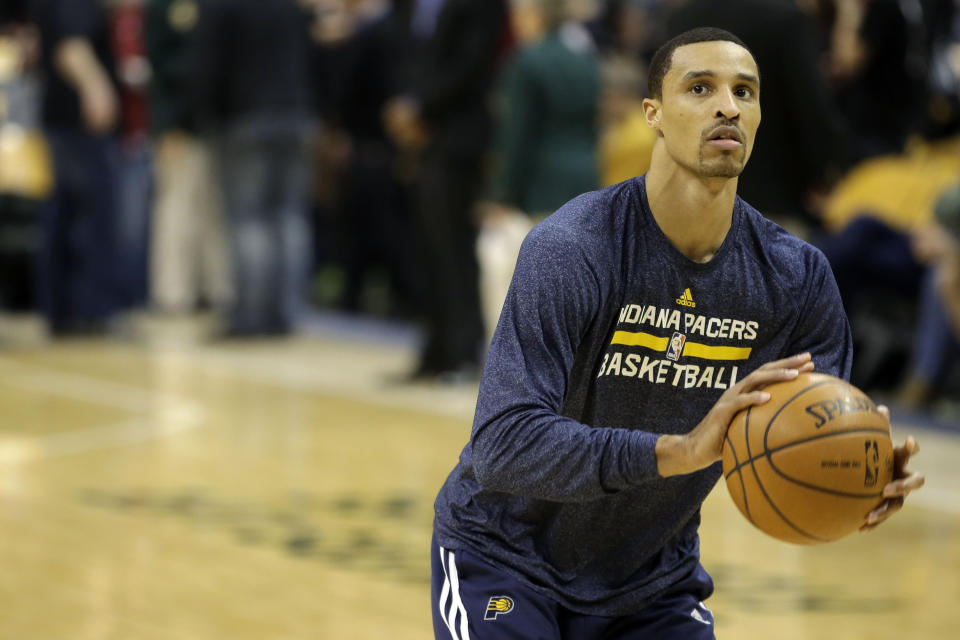 Indiana Pacers guard George Hill warms up before the start of an NBA basketball game against the Miami Heat in Indianapolis, Wednesday, March 26, 2014. (AP Photo/AJ Mast)