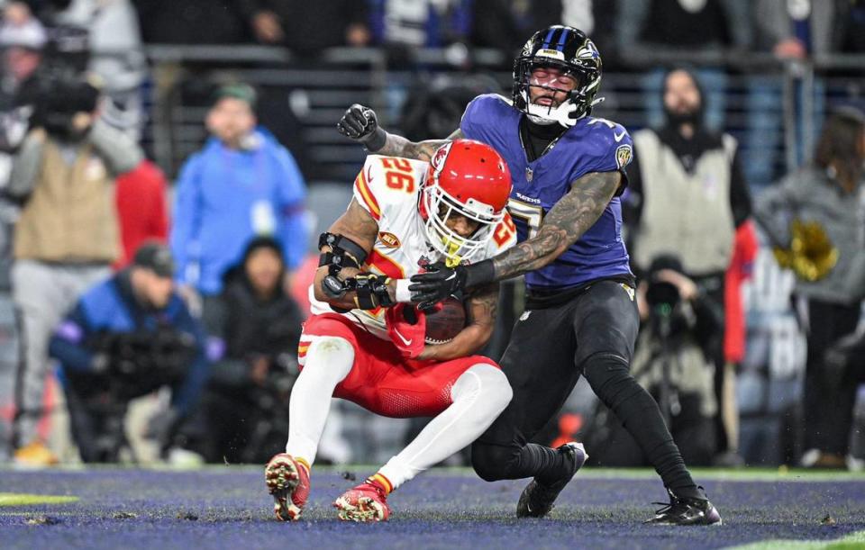 Kansas City Chiefs safety Deon Bush (26) intercepts a pass in the Ravens’ end zone intended for Baltimore Ravens wide receiver Rashod Bateman (7) in the fourth quarter Sunday, Jan. 28, 2024, during the AFC Championship Game in Baltimore.