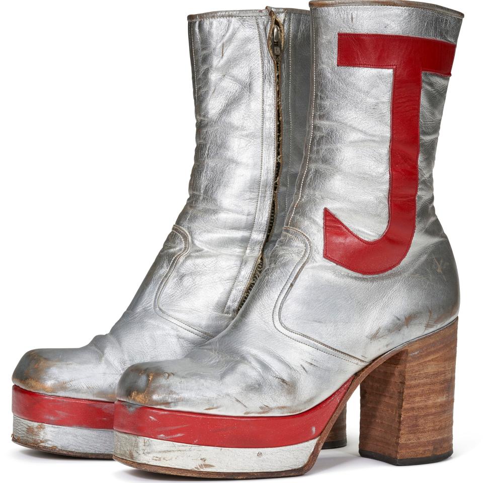 A pair of silver platform boots, with the initials ‘E’ and ‘J’, worn for live performances in the 1970s are valued at $10,000