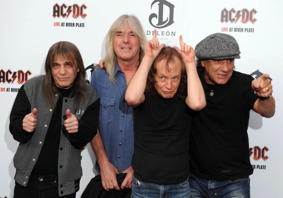 Malcolm Young (far left) with Cliff Williams, Angus Young and Brian Johnson in 2011 (Getty)