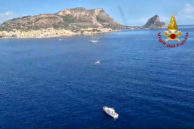 <p>Corpo Nazionale dei Vigili dei del Fuoco via Getty Images</p> Italian Coast Guard ship at site of sunken vessel on Monday, Aug. 19, 2024