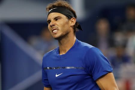 Tennis - Shanghai Masters tennis tournament - Finals - Shanghai, China - October 15, 2017 - Rafael Nadal of Spain reacts during the match against Roger Federer of Switzerland. REUTERS/Aly Song