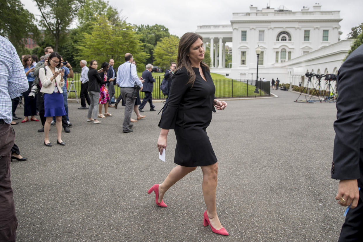 White House press secretary Sarah Huckabee Sanders departs after speaking to members of the media outside the West Wing of the White House, Wednesday, May 8, 2019, in Washington. (AP Photo/Andrew Harnik)