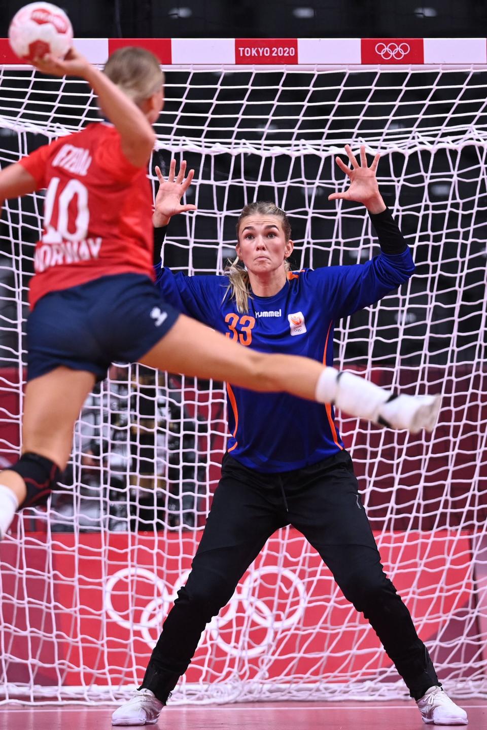 <p>Netherlands' goalkeeper Tess Wester prepares to sto pa shot during the women's preliminary round group A handball match between Norway and The Netherlands of the Tokyo 2020 Olympic Games at the Yoyogi National Stadium in Tokyo on July 31, 2021. (Photo by Daniel LEAL-OLIVAS / AFP) (Photo by DANIEL LEAL-OLIVAS/AFP via Getty Images)</p> 