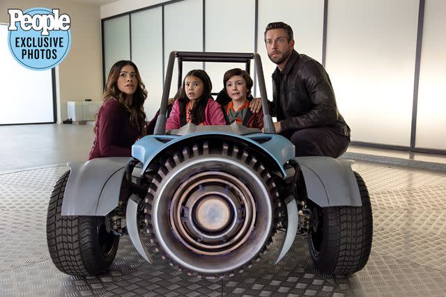 <p>Courtesy of Netflix</p> Gina Rodriguez, Everly Carganilla, Connor Esterson and Zachary Levi in Netflix's <em>Spy Kids: Armageddon</em> (2023)