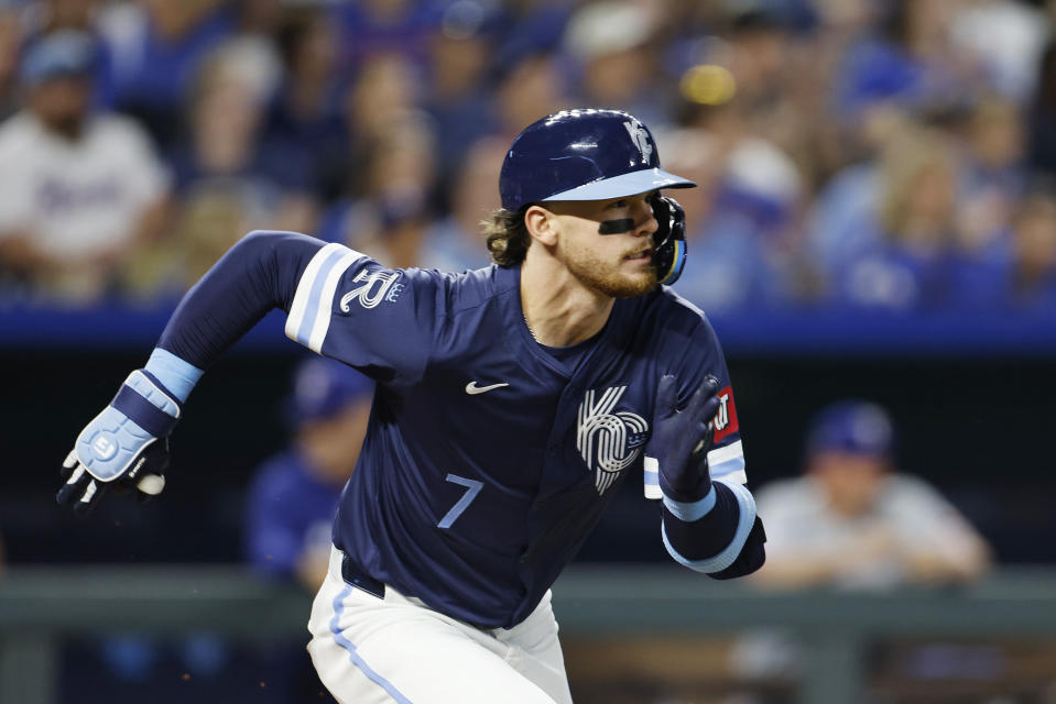 Kansas City Royals' Bobby Witt Jr. heads to first base after hitting a two-run single during the seventh inning of a baseball game against the Texas Rangers in Kansas City, Mo., Friday, May 3, 2024. (AP Photo/Colin E. Braley)