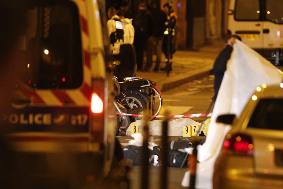 <p>A dead body lays under a blanket after a knife attack Saturday that left at least two dead including the assailant in central Paris, early Sunday May 13, 2018. (Photo:Thibault Camus/AP) </p>