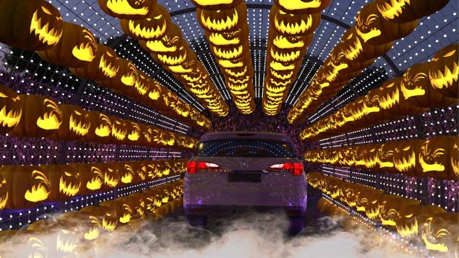 A tunnel kicked off Haunt 'O Ween, a drive-thru that had seemingly random decorations bit did give away pumpkins in Woodland Hills.