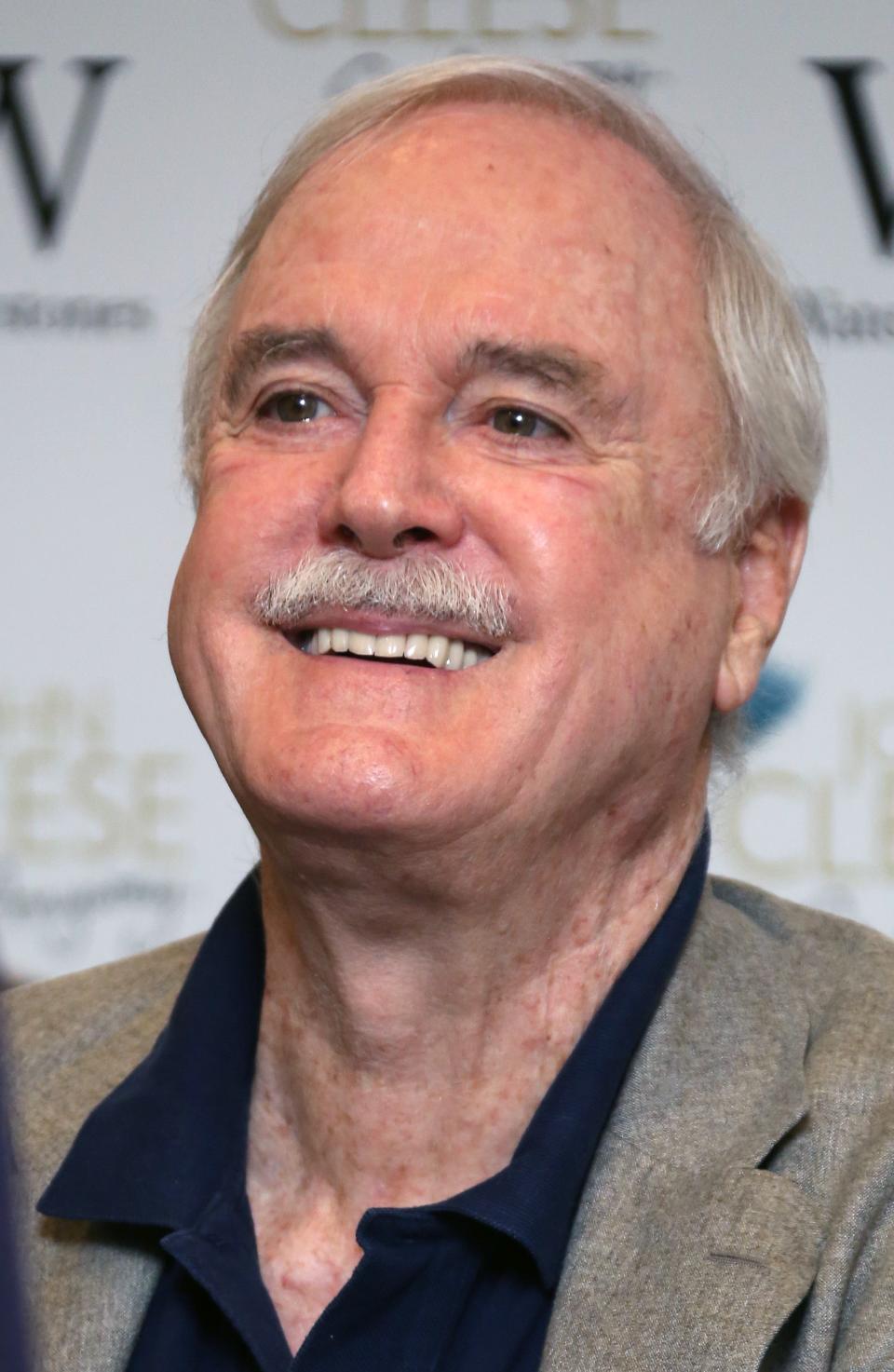 John Cleese
British comedian John Cleese signs copies of his book 'So, Anyway', ahead of the book signing at Waterstones Piccadilly, in central London, Thursday, Oct. 9, 2014. (Photo by Joel Ryan/Invision/AP)