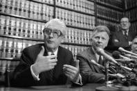 Former FBI officials, Mark Felt, left, and Edward S. Miller, appear at a news conference, in this April 15, 1981 file photo after learning that President Reagan had pardoned them from their conviction of unauthorized break-ins during the Nixon administration's search for opponents during the Vietnam War. Felt, the former FBI second-in-command who revealed himself as "Deep Throat" 30 years after he tipped off reporters to the Watergate scandal that toppled a president. (AP Photo/Bob Daugherty)