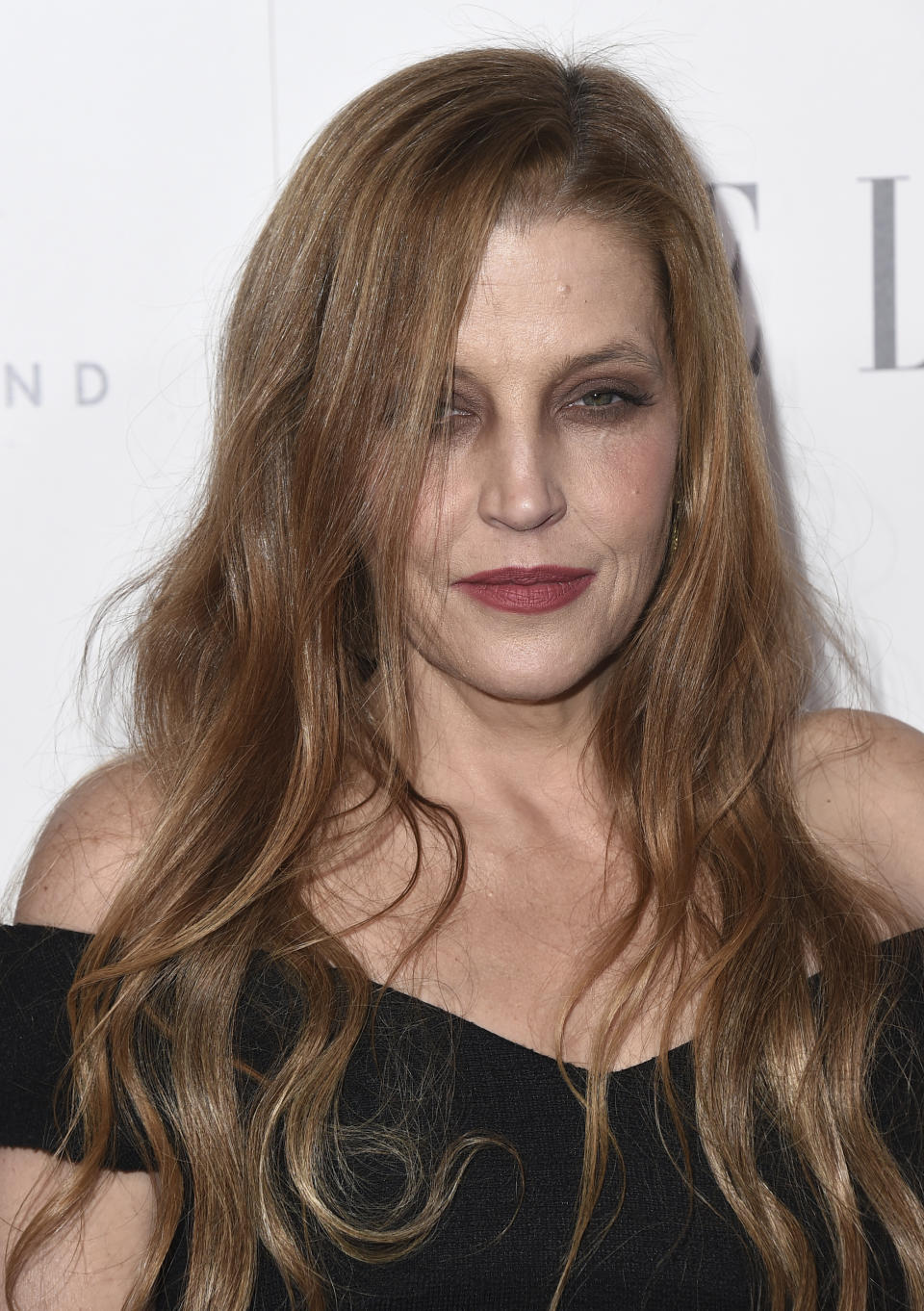 FILE - Lisa Marie Presley arrives at the 24th annual ELLE Women in Hollywood Awards at the Four Seasons Hotel Beverly Hills on Oct. 16, 2017, in Los Angeles. Presley, singer and only child of Elvis, died Thursday, Jan. 12, 2023, after a hospitalization, according to her mother, Priscilla Presley. She was 54. (Photo by Jordan Strauss/Invision/AP, File)