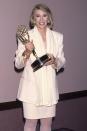 <p>The late fashionable comedian wore a monochromatic look when she picked up her Emmy award for Outstanding Talk Show Host. </p>