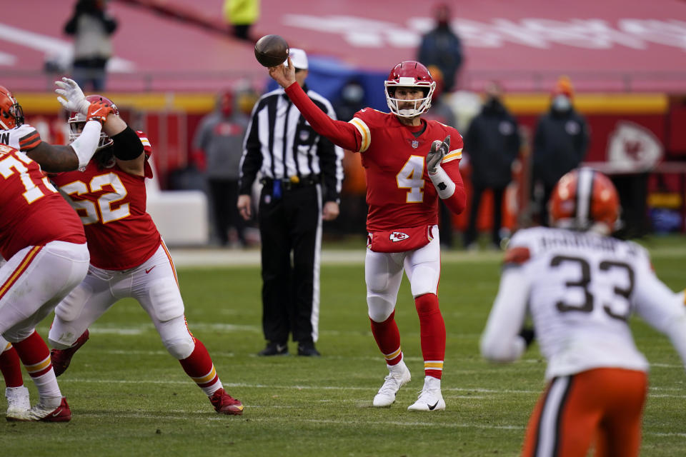 Kansas City Chiefs quarterback Chad Henne throws a pass during the second half of an NFL divisional round football game against the Cleveland Browns, Sunday, Jan. 17, 2021, in Kansas City. (AP Photo/Jeff Roberson)