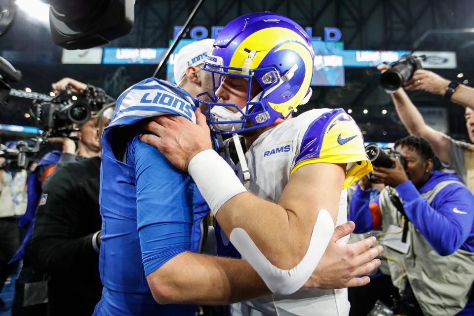 Detroit Lions quarterback Jared Goff (16) hugs Los Angeles Rams quarterback Matthew Stafford (9) after 24-23 win at the NFC wild-card game at Ford Field in Detroit on Sunday, Jan, 14, 2024.