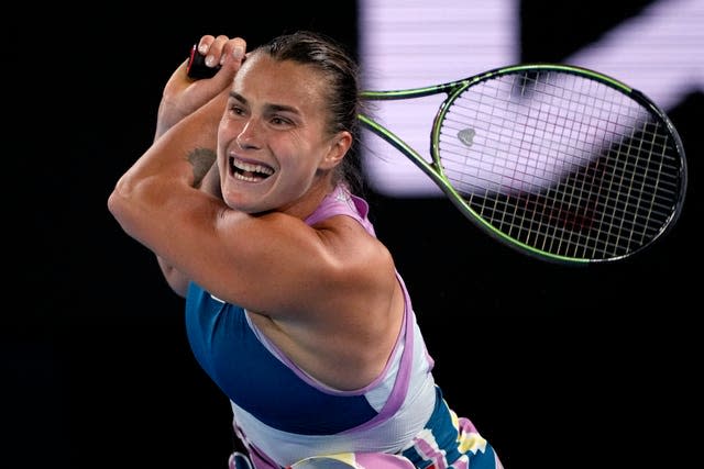 Aryna Sabalenka hits a backhand