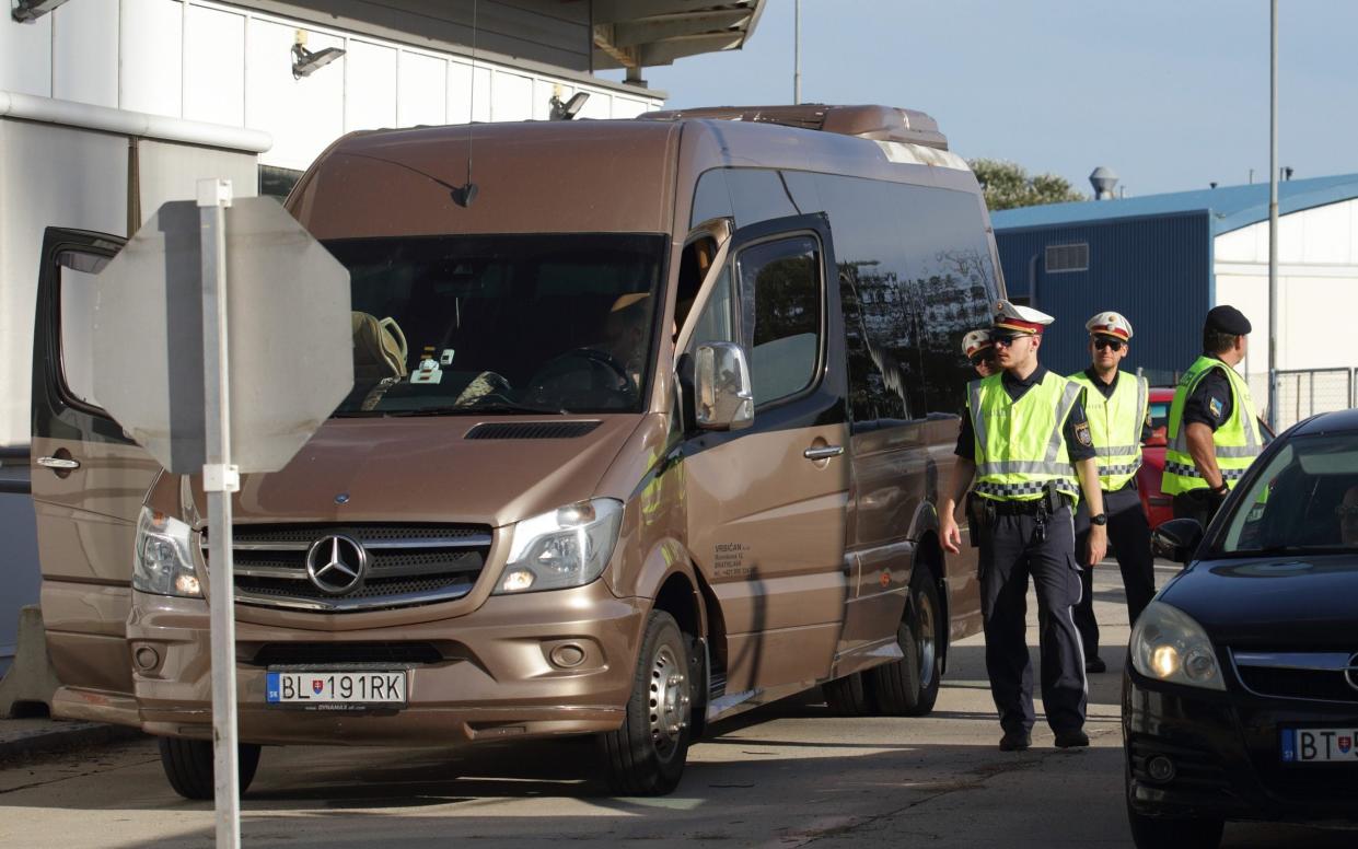 Police in Austria check cars and vans arriving from Slovakia. The number of asylum applications have nearly doubled in Austria over the past two years