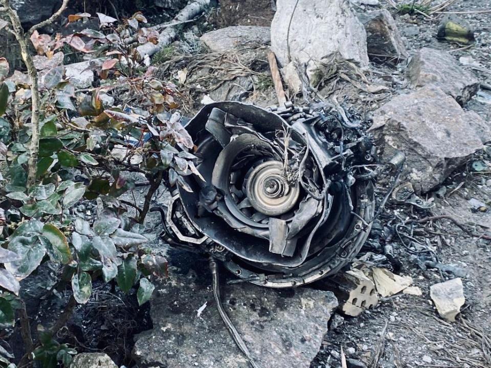 Part of a Russian missile that was downed by Ukrainian defenses is seen on the ground in Kyiv, Ukraine, March 16, 2022. / Credit: CBS News