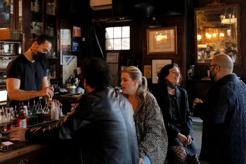 FILE PHOTO: Restrictions ease for bars, allowing seating at the bar, during the coronavirus disease (COVID-19) in Manhattan, New York City.