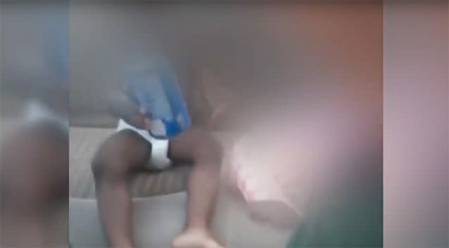 The baby appears to be smoking in the video. Photo: YouTube