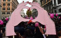 <p>People hold signs and pink balloons during a demonstration to mark the International Day for the Elimination of Violence Against Women in Rome on Nov. 25, 2017. (Photo: Tiziana Fabi/AFP/Getty Images) </p>