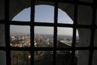 In this photo taken on Tuesday, March 17, 2020, a view of Bergamo, the heart of the hardest-hit province in Italy's hardest-hit region of Lombardy, Italy. It was the biggest soccer game in Atalanta’s history and a third of Bergamo’s population made the short trip to Milan’s famed San Siro Stadium to witness it. Nearly 2,500 fans of visiting Spanish club Valencia also traveled to the Champions League match. More than a month later, experts are pointing to the Feb. 19 game as one of the biggest reasons why Bergamo has become one of the epicenters of the coronavirus pandemic — a “biological bomb” was the way one respiratory specialist put it — and why 35% of Valencia’s team became infected. The new coronavirus causes mild or moderate symptoms for most people, but for some, especially older adults and people with existing health problems, it can cause more severe illness or death. (AP Photo/Luca Bruno)