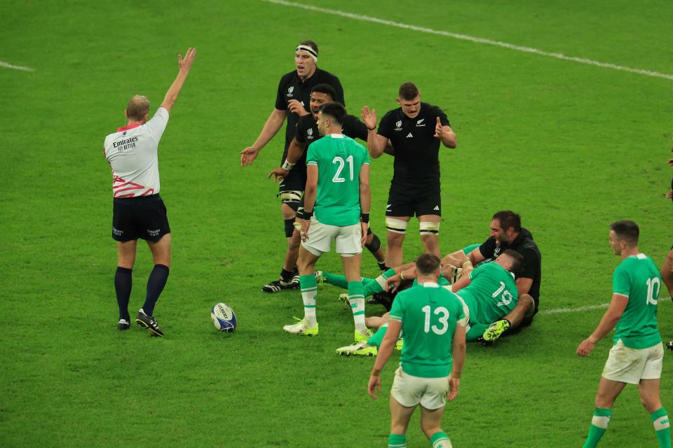 The referee blows the full-time whistle (AFP via Getty Images)