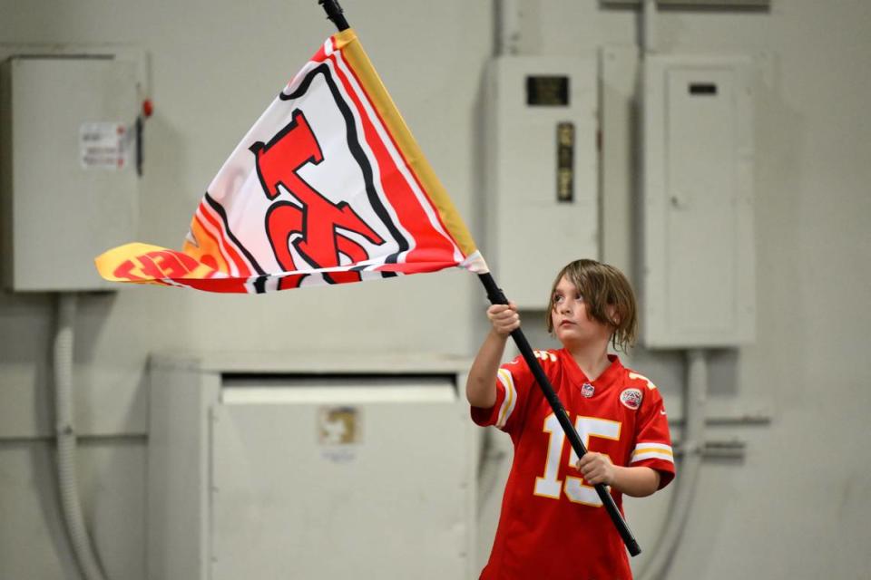 A young Kansas City Chiefs fan urges his team on during their game against the Dallas Cowboys during the USA Wheelchair Football League Championship, a program of Move United, Tuesday, Feb. 6, 2024 in Dallas, Texas.
