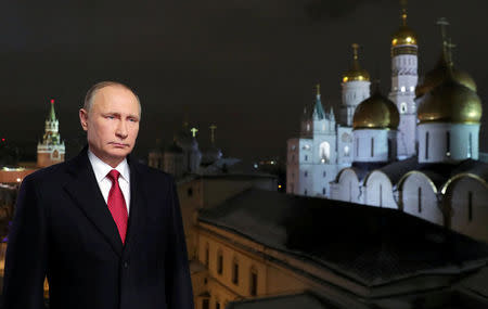 FILE PHOTO: Russia's President Vladimir Putin makes his annual New Year address to the nation in Moscow, Russia, December 31, 2016. REUTERS/File Photo