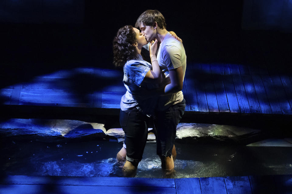 This image released by Boneau/Bryan-Brown shows Jordan Tyson, left, and John Cardoza during a performance of "The Notebook" in New York, the new musical based on the bestselling novel by Nicholas Sparks that inspired the iconic film. (Julieta Cervantes/Boneau/Bryan-Brown via AP)