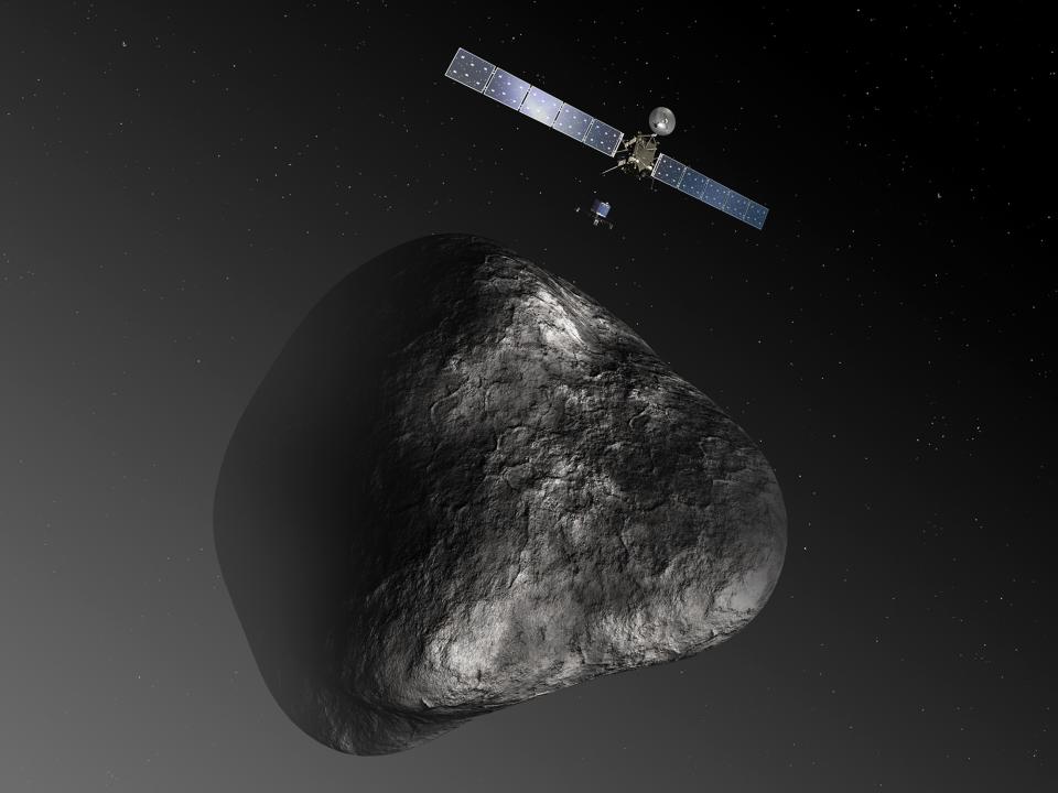 An artist's impression handout image by the European Space Agency shows the Rosetta orbiter deploying the Philae lander to comet 67P/Churyumov�Gerasimenko. After a 10-year journey, the Rosetta spacecraft is due to end its hibernation on January 20, 2014 and prepare for an unprecedented mission to orbit the comet and dispatch a lander to the surface. The image is not to scale; the Rosetta spacecraft measures 32 m across including the solar arrays, while the comet nucleus is thought to be about 4 km wide. (REUTERS/European Space Agency-C. Carreau/ATG medialab/Handout via Reuters)