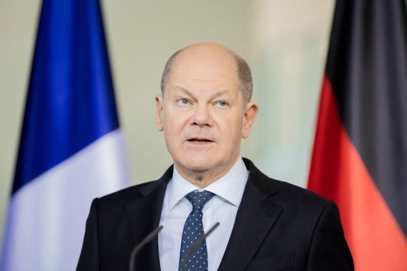 German Chancellor Olaf Scholz speaks during a press statement with Polish Prime Minister Donald Tusk and French President Emmanuel Macron (Not Pictured) after the so-called Weimar Triangle meeting. Christoph Soeder/dpa