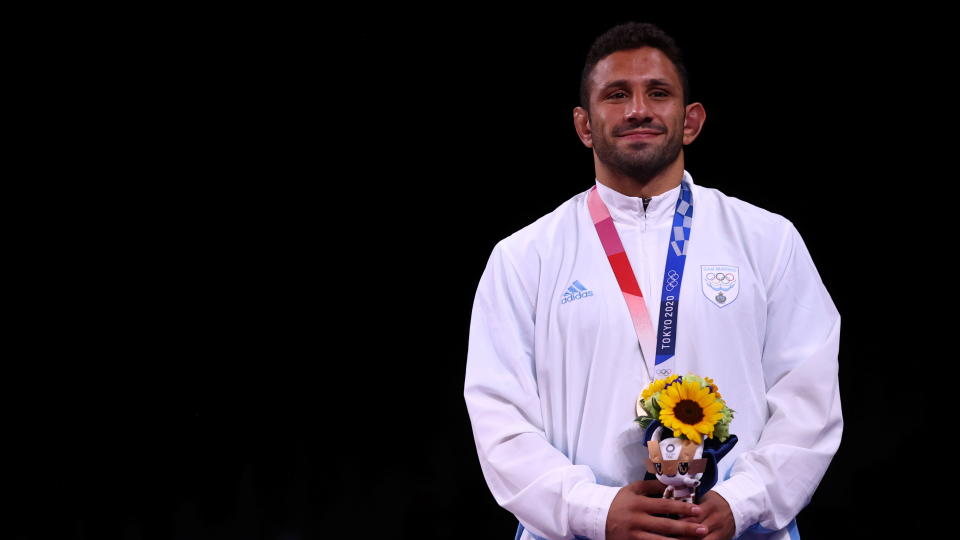 Tokyo 2020 Olympics - Wrestling - Freestyle - Men's 86kg - Medal Ceremony - Makuhari Messe Hall A, Chiba, Japan - August 5, 2021. Bronze medallist Myles Nazem Amine of San Marino poses with his medal. REUTERS/Leah Millis