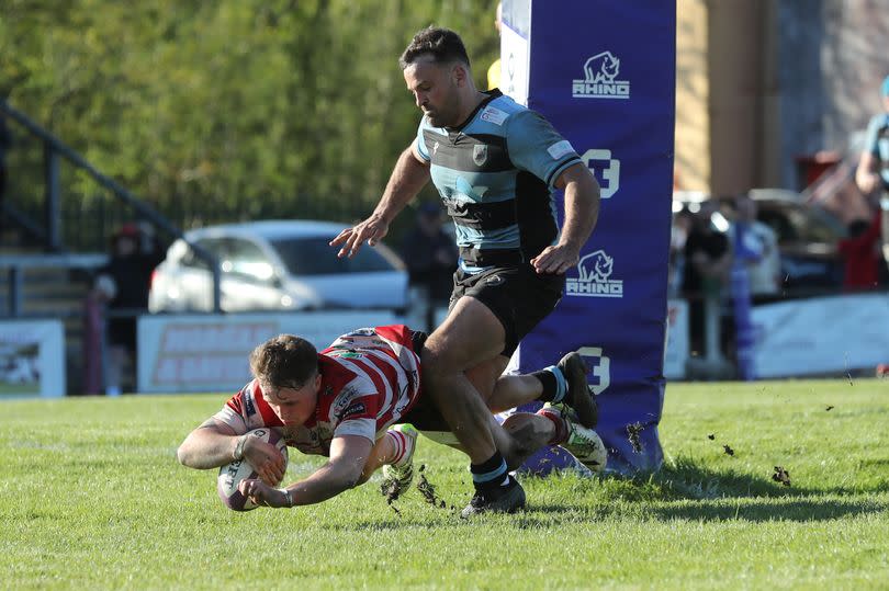 Macs Page of Llandovery scores a try
