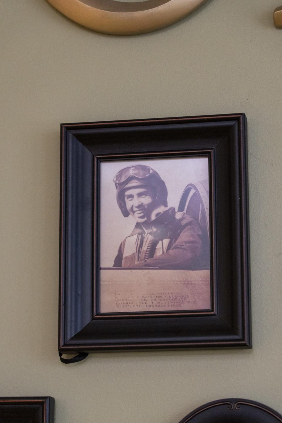 A photo of a young George Burson hangs on the Wall of Honor at Brookdale. He flew 50 missions in an F-84 during the Korean War.