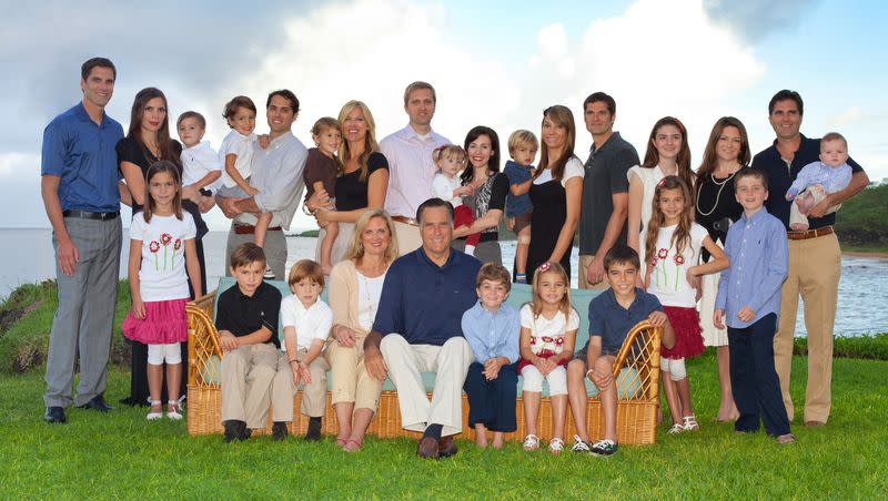 Mitt and Ann Romney pose with their family in 2012.