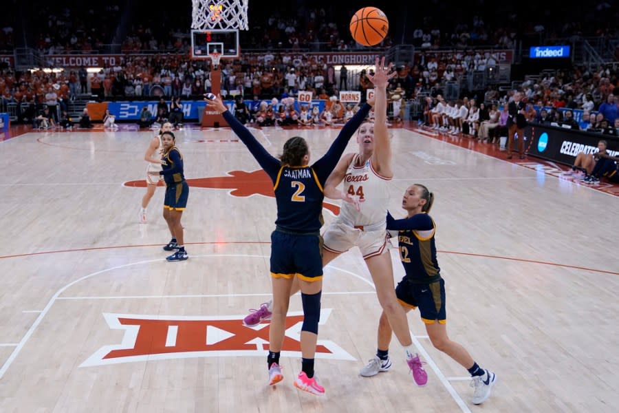 Texas forward Taylor Jones (44) shoots over Drexel forward Hetta Saatman (2) during the first half of a first-round college basketball game in the women’s NCAA Tournament in Austin, Texas, Friday, March 22, 2024. (AP Photo/Eric Gay)