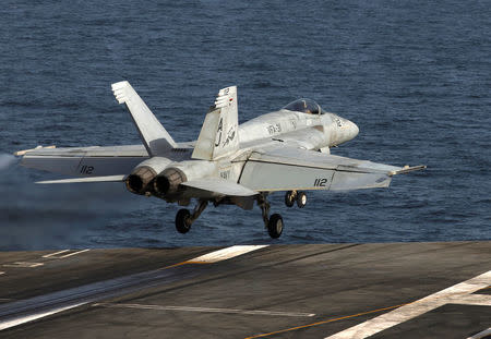 An F/A-18E Super Hornet of Strike Fighter Squadron (VFA) 31, is catapulted off the flight deck of the U.S. aircraft carrier, USS George H. W. Bush in Gulf of Oman in this photo taken on March 20, 2017. REUTERS/Hamad I Mohammed