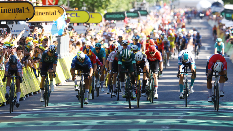 Dylan Groenewegen lunges for the line to beat Jasper Philipsen and win stage six of the 2024 Tour de France