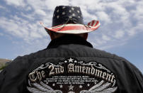 <p>A man wears a patriotic-themed cowboy hat during a pro gun-rights rally at the state capitol, Saturday, April 14, 2018, in Austin, Texas. (Photo: Eric Gay/AP) </p>