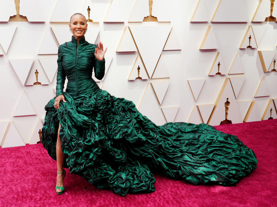 Jada wearing a giant emerald green ruffled gown