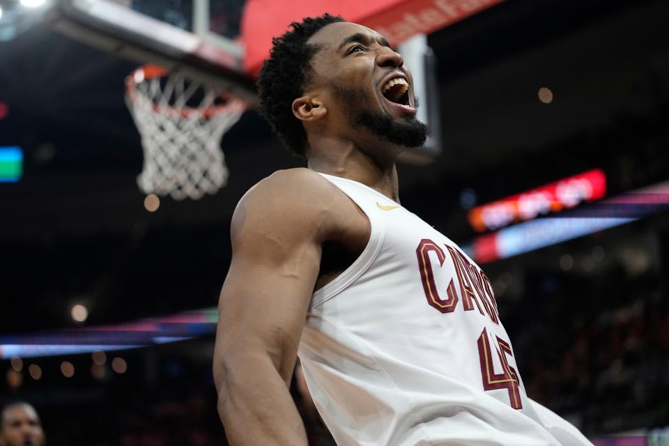 Cleveland Cavaliers guard Donovan Mitchell celebrates after a dunk in the second half against the Sacramento Kings on Monday in Cleveland.