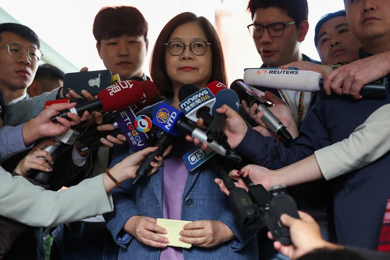 Taiwan's Ocean Affairs Council Minister Kuan Bi-ling speaks to the media before entering the parliament in Taipei